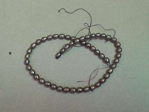 Brilliant Bronze Coloured Rice Pearls - 6x7mm - 15" Strand