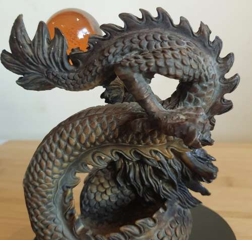 Highly Detailed Bronze Dragon with Hand Blown Glass Golden Orb on Wooden Plinth