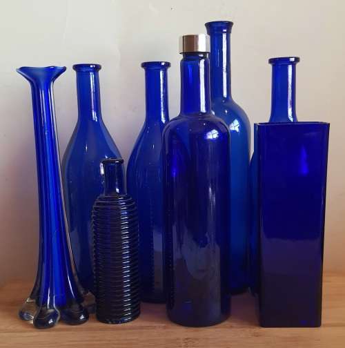 Lot of 6 Cobalt Blue Glass Bottles and 2 Vases - Bid for ALL