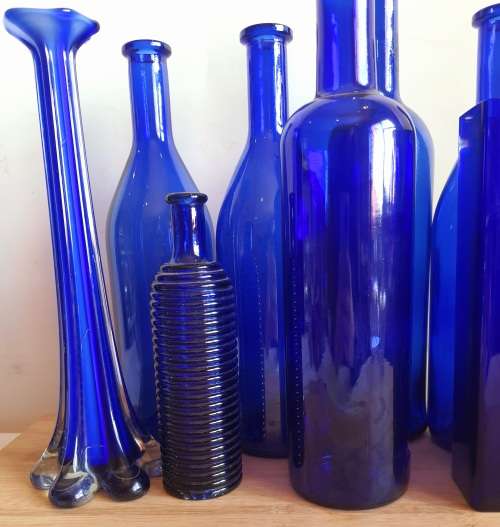 Lot of 6 Cobalt Blue Glass Bottles and 2 Vases - Bid for ALL