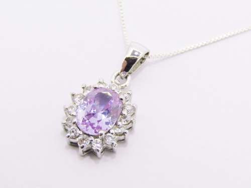 An Elegant Lilac Zirconia Pendant on Chain in Sterling Silver.