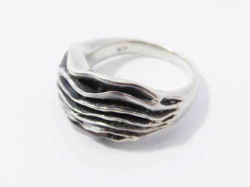 A Gorgeous Weighty Multi Layered Brutalist Design Ring in Sterling Silver.