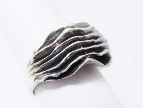 A Gorgeous Weighty Multi Layered Brutalist Design Ring in Sterling Silver.