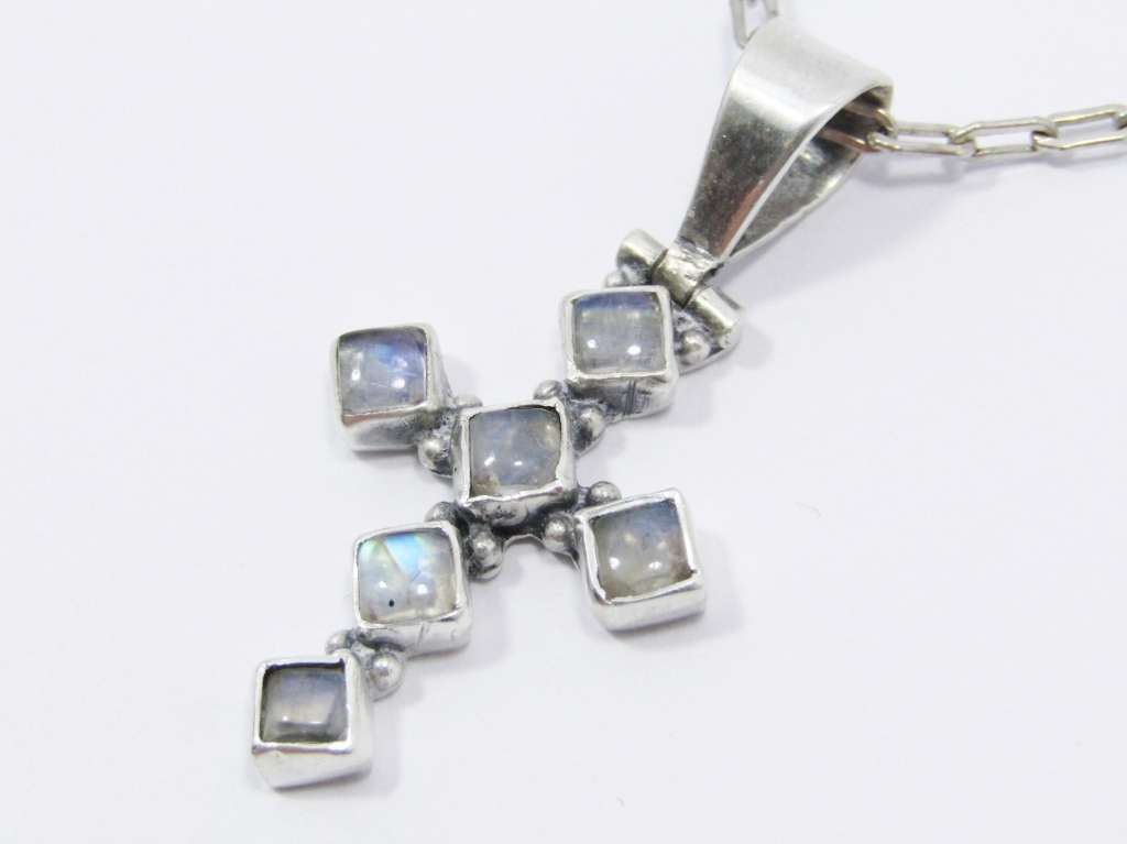 A Very Pretty Moonstone Cross Pendant on Chain in Sterling Silver.
