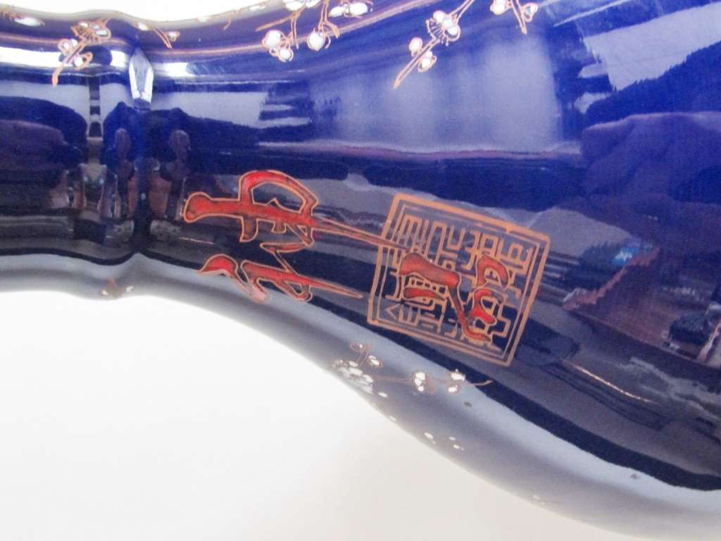 Two Gorgeous Chinese Dark Blue Chinese Porcelain Vases With White Blossoms