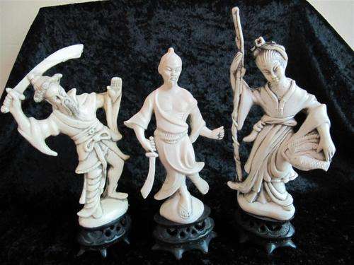 Three vintage Oriental Resin Ivorene Figurines on stands