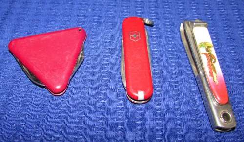 3 POCKET KNIVES including a Swiss Army Knife