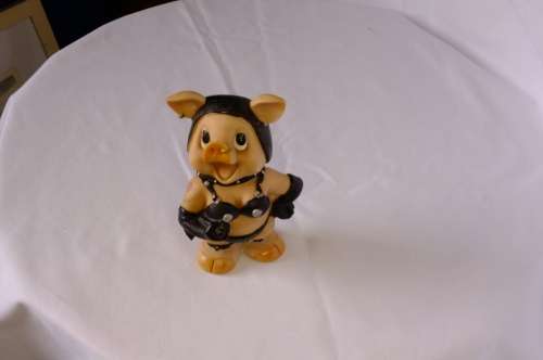 interesting!!! Kinky piggy figurine.