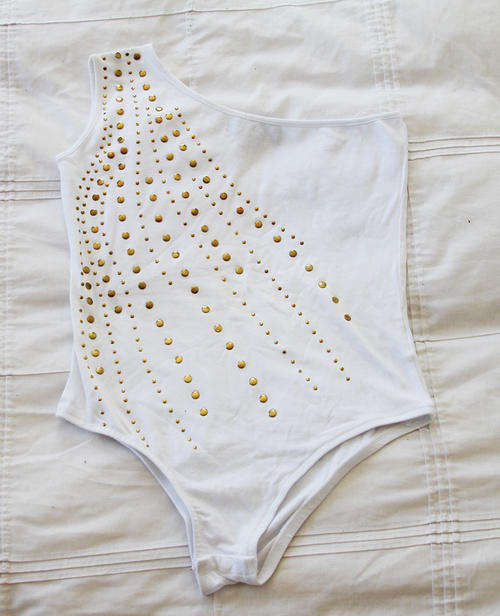 Pretty white and gold body top
