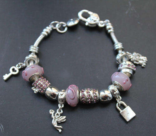 STUNNING STERLING SILVER PANDORA CHARM BRACELET