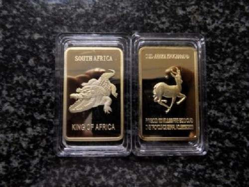 SOUTH AFRICAN CROCODILE GOLD PLATED BAR IN ENCLOSED CAPSULE SEE PICS!!!!!!!