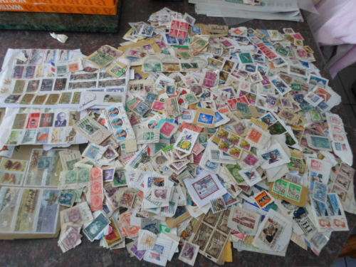 1000 X WORLD STAMPS USED ON PAPER SEE PICS!!!!!