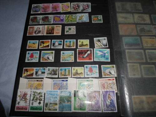 LARGE ALBUM RHODESIA AND SA HOMELAND STAMPS SEE PICS!!!!