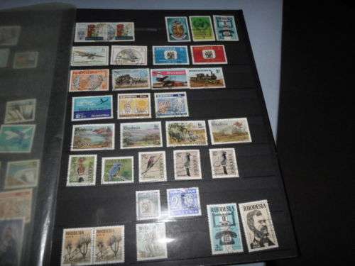 LARGE ALBUM RHODESIA AND SA HOMELAND STAMPS SEE PICS!!!!