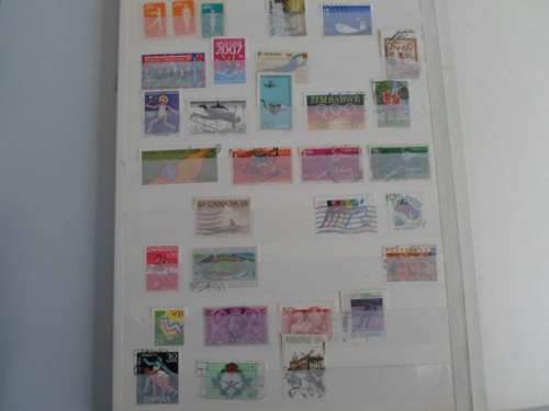 LARGE ALBUM MIXED WORLD STAMPS 7 PAGES WITH STAMPS 5 BLANK PAGES SEE PICS