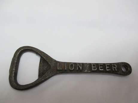 antique bottel opener - LION BEER