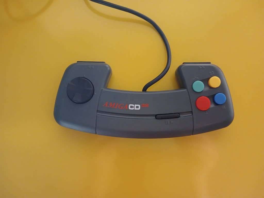 Commodore Amiga CD 32 console with Games