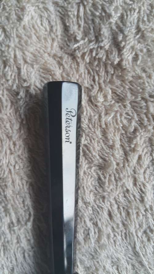 Peterson tobacco tamper with leather holder