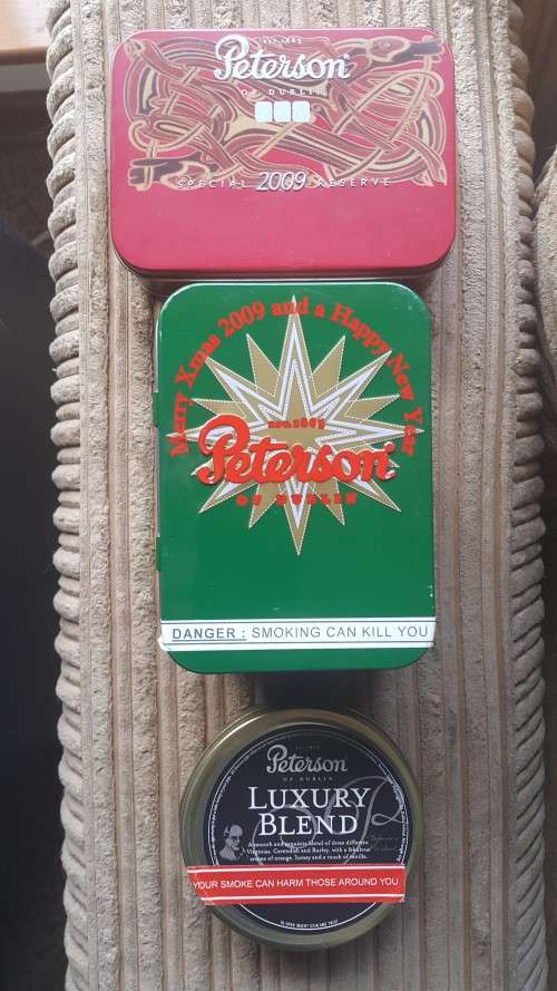 Peterson tobacco tins (2 unopened)