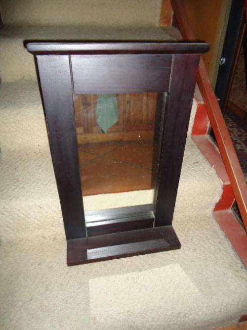 Wood framed mirror with shelf