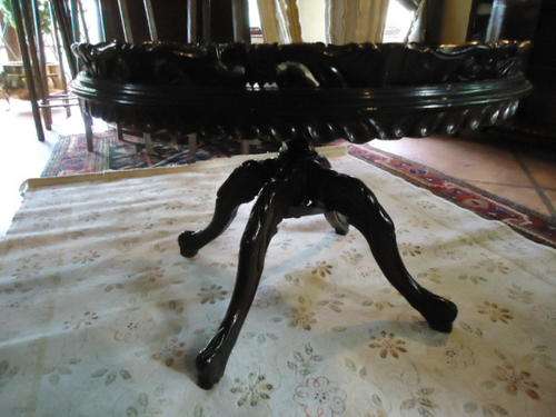 Stunnimg carved Italian Wine table