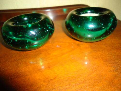 A pair  of heavy glass teelite holders