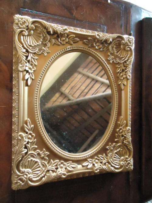 Small plactic framed  mirror