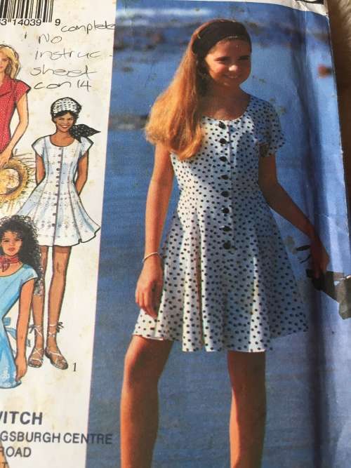 PATTERN STYLE 2303 (CUT ON 14, NO INSTRUCTION SHEET) - GIRLS` DRESSES & PLAYSUIT (SIZE 9-14)