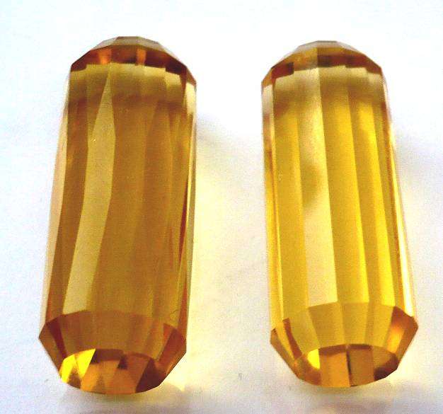 Massive Citrine pair.   Golden yellow.  Total weight:  86.660cts.