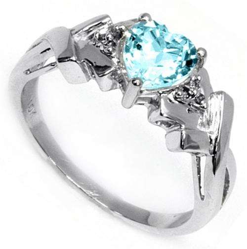 10k SOLID WHITE GOLD BLUE TOPAZ  AND DIAMOND RING .   BEAUTIFUL HEART SHAPE.