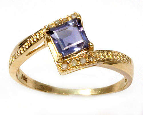 10k SOLID YELLOW GOLD IOLITE  AND DIAMOND RING .   0.900CTS!