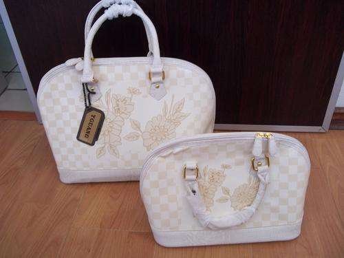 **SPECIAL OFFER**DESIGNER STYLE ladies hand bag in CREAM. Trendy & fashionable.BUY ONE GET ONE FREE!