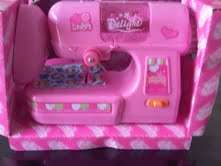 Battery Operated sewing maching that actually sews,with 2 cotton bobbin and operating light!!!