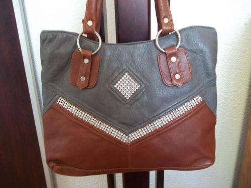 *** NEW ARRIVALS***Stunning 100%  Genuine Leather Hand Bag in brown. A great buy!.