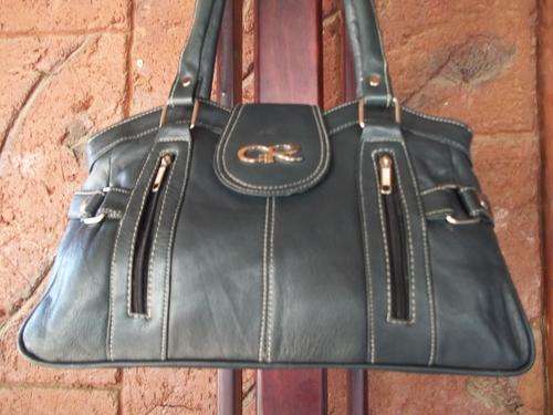 ONLY ONE* GORGEOUS NEW ARRIVALS***Stunning 100%  Genuine leather Hand Bag in BLACK . A great buy!.
