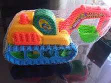 Brightly colour Backhoe with eight shape sorter