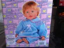 Baby Doll that SMILES, CRYS sounds like a real baby, and TEARS drop while she crys. PERFECT GIFT