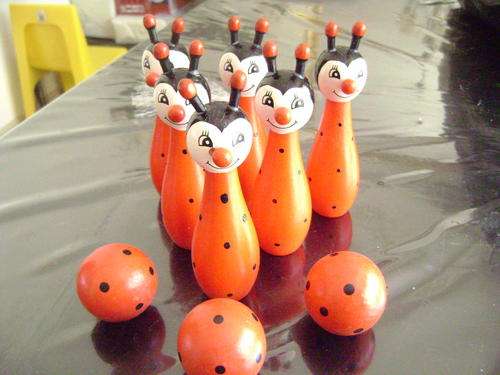 Wooden bowling set in bright colours. Creating endless amusement for baby