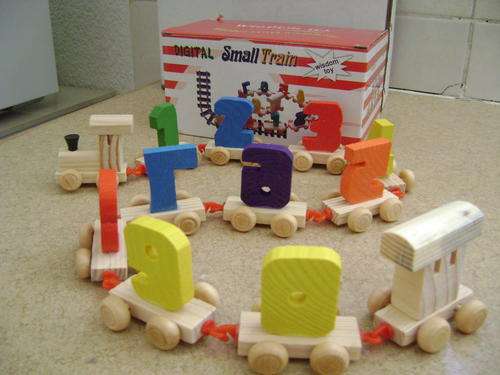 Beautiful, bright coloured and adorable wooden number train- made to last