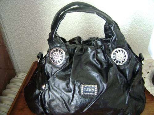 Beautiful ladies Black PU leather bag with silver trim