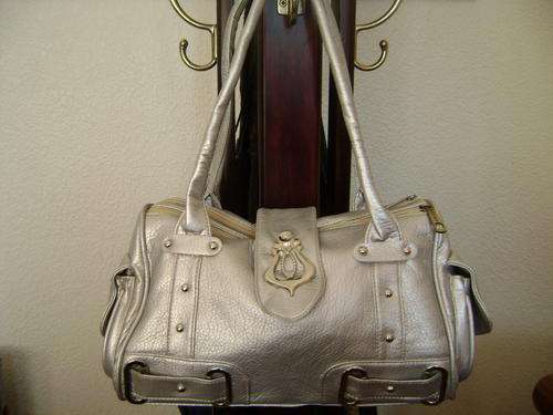 Beautiful ladies Soft leather look bag in silver. Look great anytime