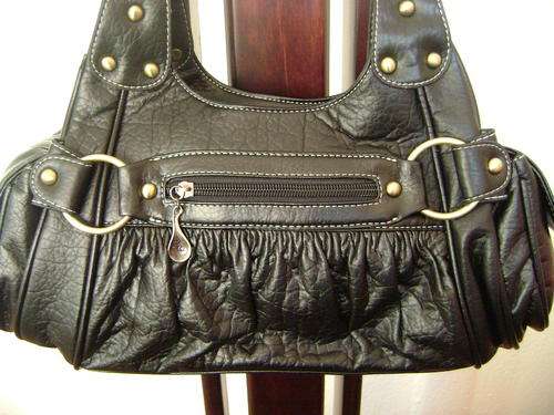 Beautiful designer style ladies Soft leather look hand bag in Black. Look great anytime
