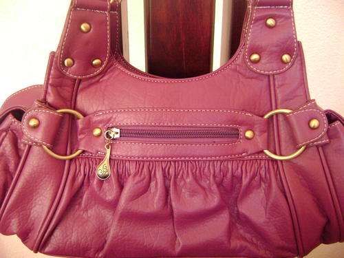 Beautiful designer style ladies Soft leather look hand bag in Funky Purple. Look great anytime