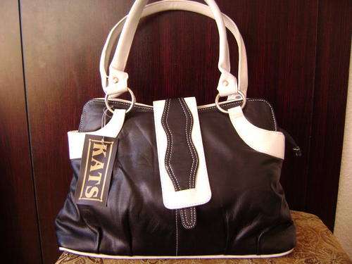 Stunning 100%  Genuine leather  Hand Bag in Black and White.  Invest in leather,the smart choice.