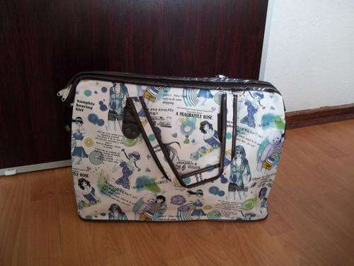 Modern and trendy large  print travel bag in faux leather- A great accessory
