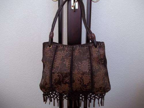 Beautiful ladies leather look hand bag in brown with crochet and beaded detail. Great everyday bag