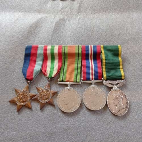 SET OF 5 MEDALS WITH MATCHING MINIATURES. NAMED CPL. C.W. GOVER No. 7013078 ROYAL INNISKILLING FUS.