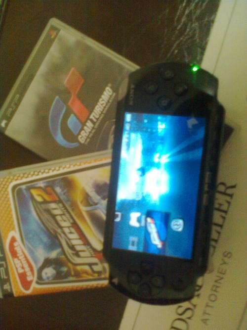 PSP 3000 AND 2GAMES