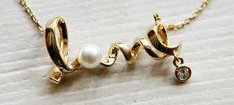 IMPORTED STOCK! Beautiful ***LOVE*** Gold Clad Necklace!