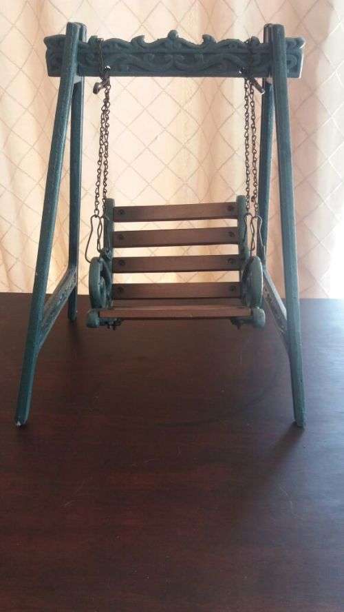 castiron and wooden swing cair